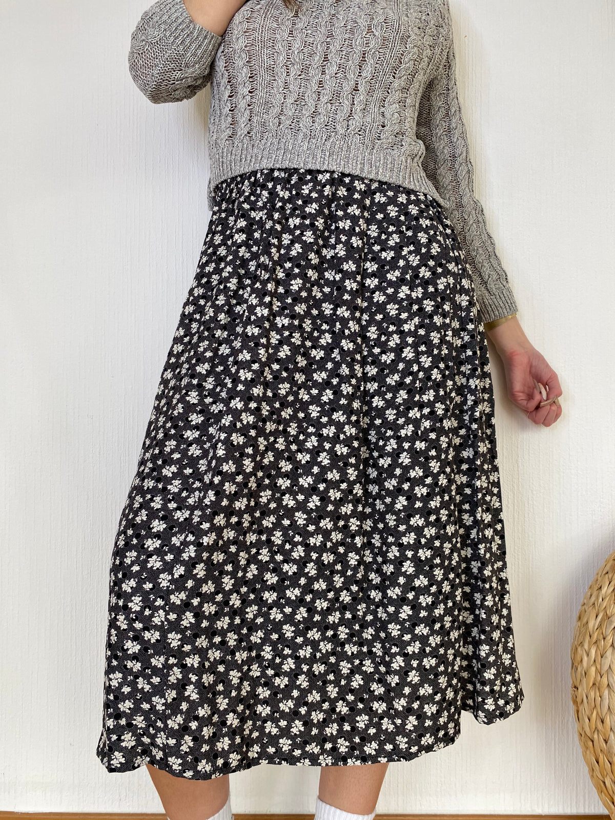 Jupe noire à fleurs blanche M