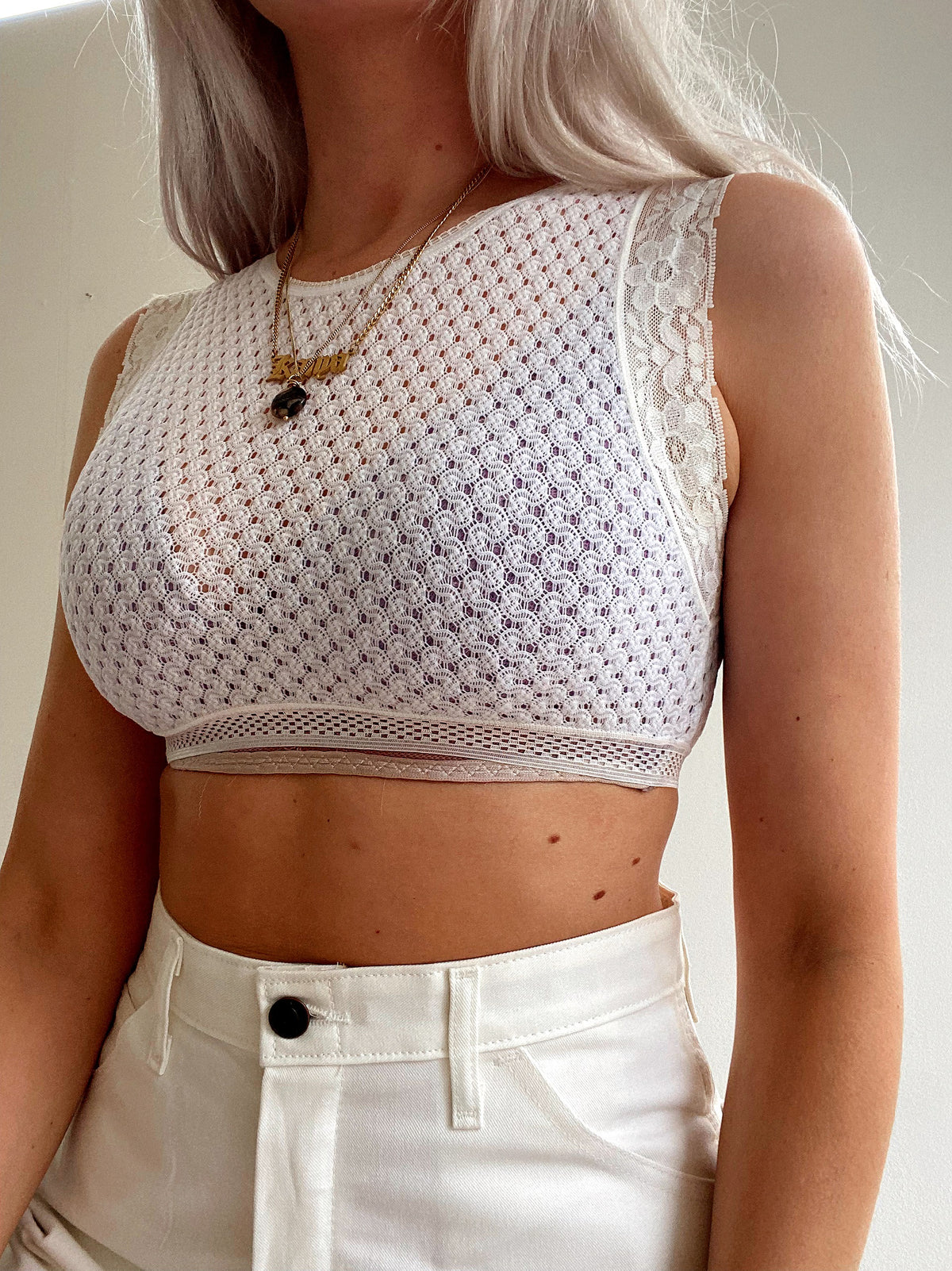 Crop top blanc transparent avec bordures en dentelle XS
