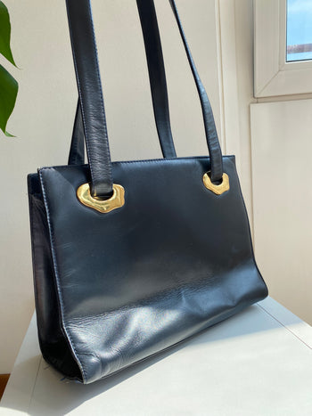 Vintage black rigid handbag