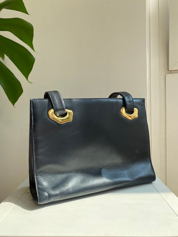 Vintage black rigid handbag