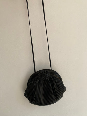 Vintage black rigid handbag