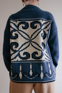 Blue knit turtleneck sweater with beige patterns M