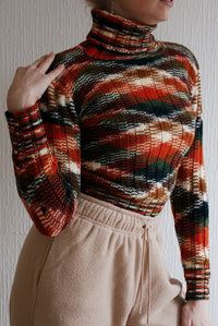 Blue knit turtleneck sweater with beige patterns M
