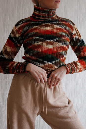 Blue knit turtleneck sweater with beige patterns M