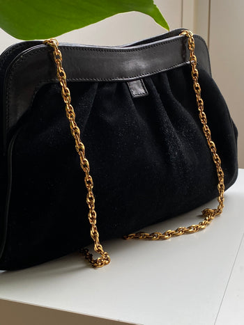 Vintage black handbag with golden chain