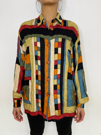 Colorful blouse with geometric patterns