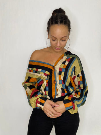 Colorful blouse with geometric patterns