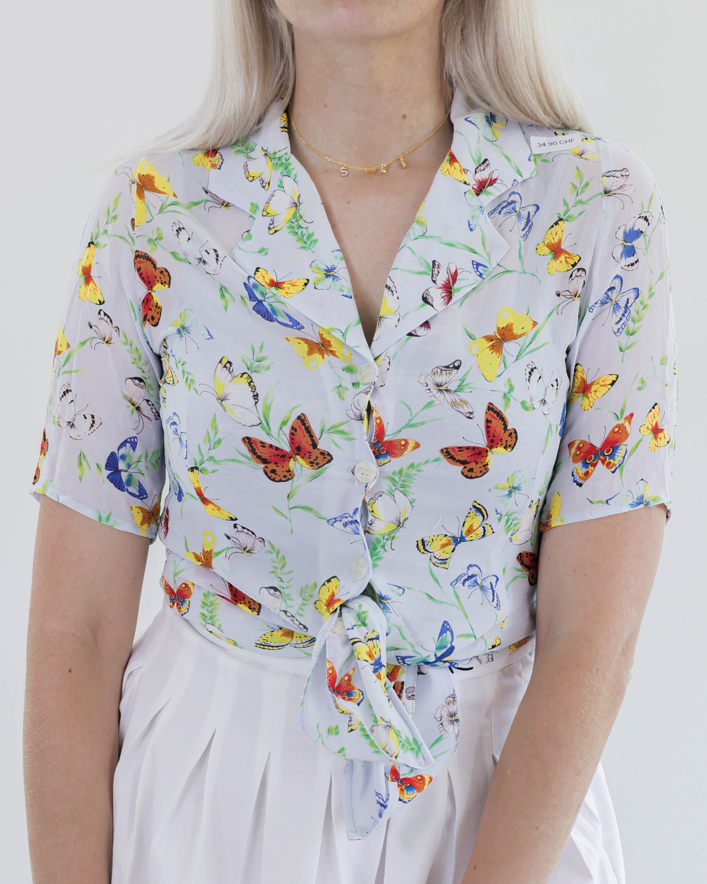 Chemisier en soie 80s/90s bleu clair motifs papillons S