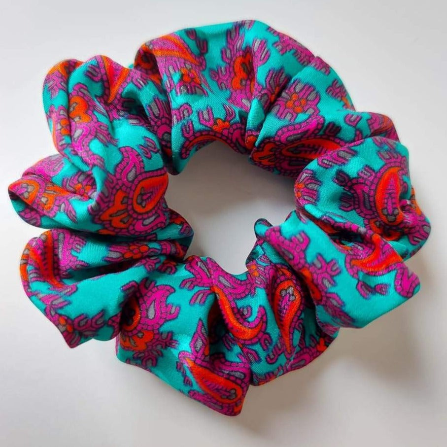 Turquoise satin scrunchie with patterns by Chuperchouchou