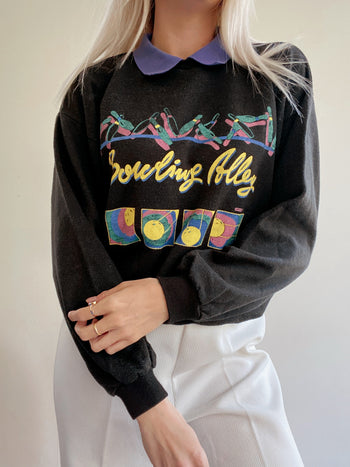 Pull USA vintage noir et violet S