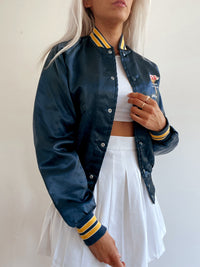 Dunkelblaue und gelbe College-Bomberjacke aus den USA