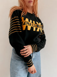 Pull vintage américain noir et jaune brodé L