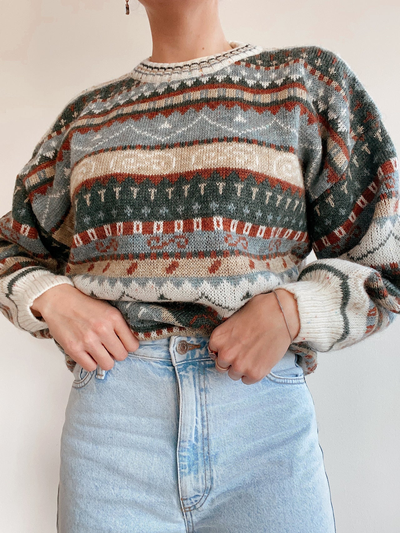 Blue knit turtleneck sweater with beige patterns M