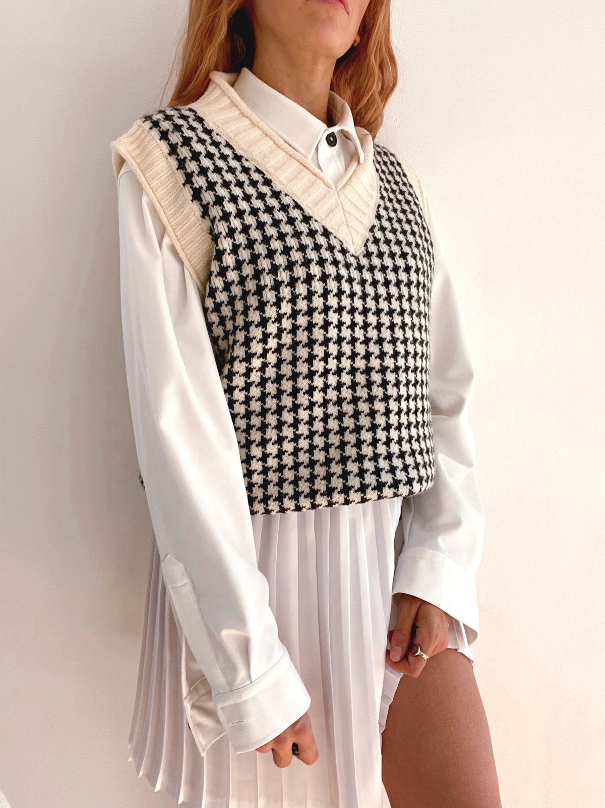 Gilet vintage sans manche en laine noir et blanc cassé L