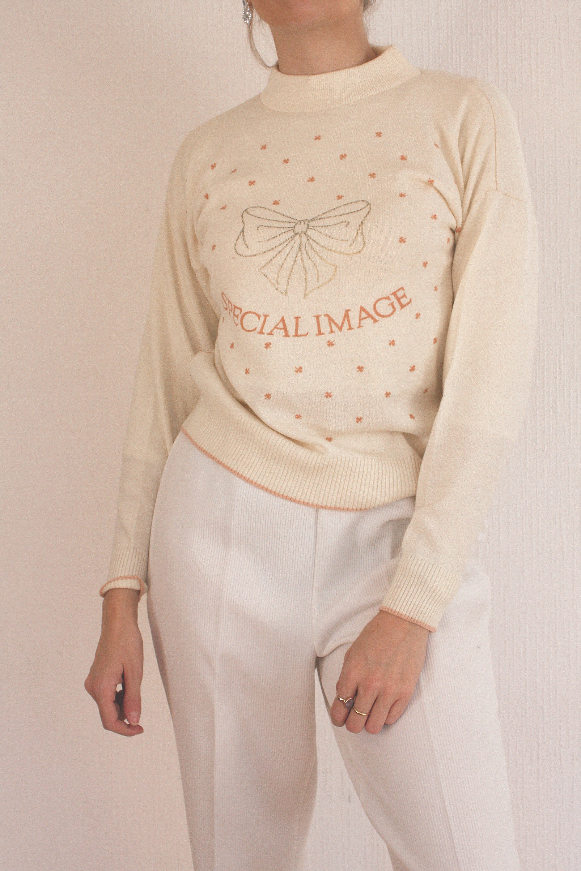 Blue knit turtleneck sweater with beige patterns M