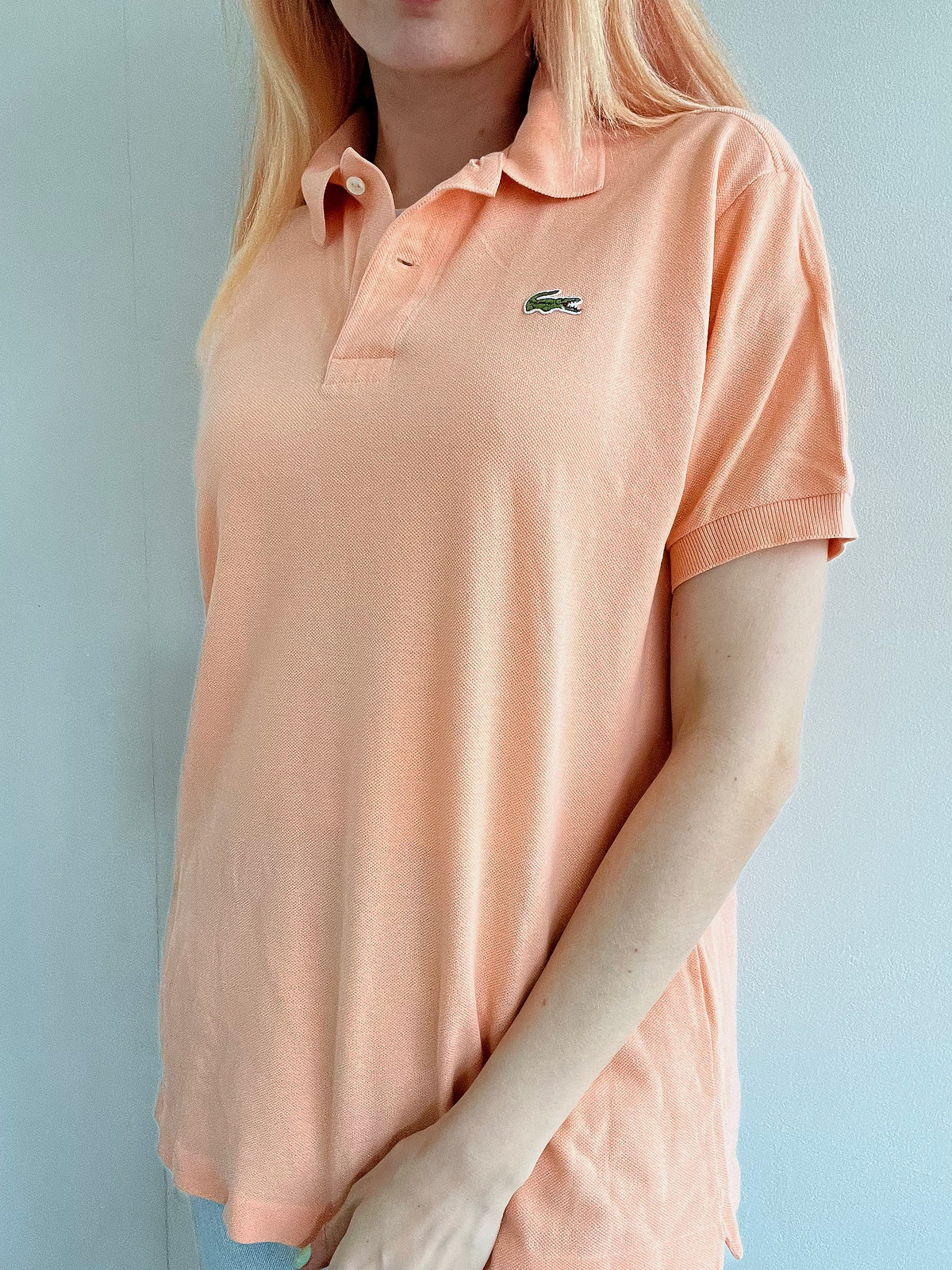 Polo Lacoste saumon clair M