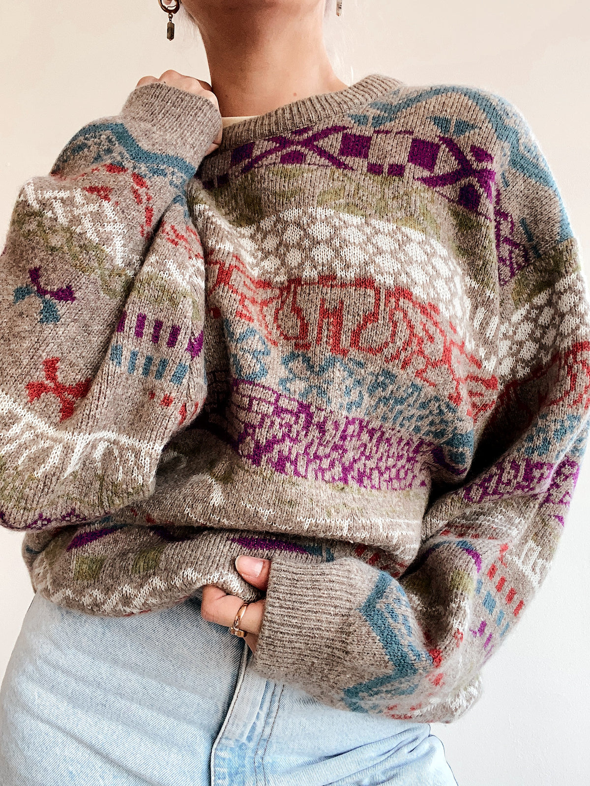 Blue knit turtleneck sweater with beige patterns M