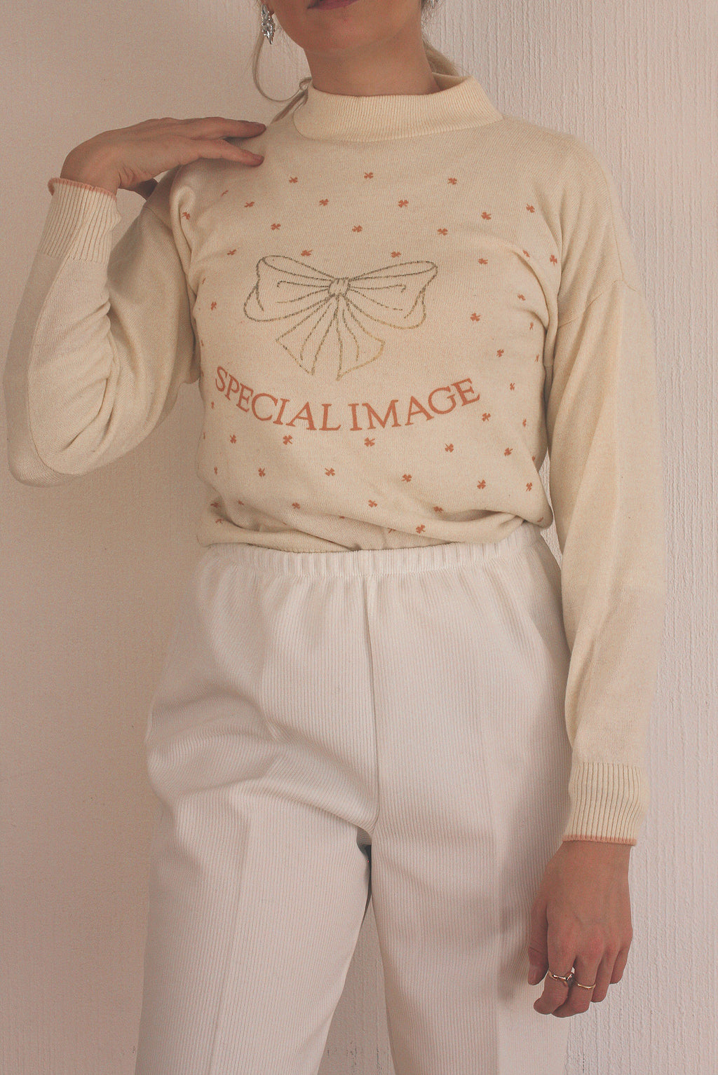 Blue knit turtleneck sweater with beige patterns M