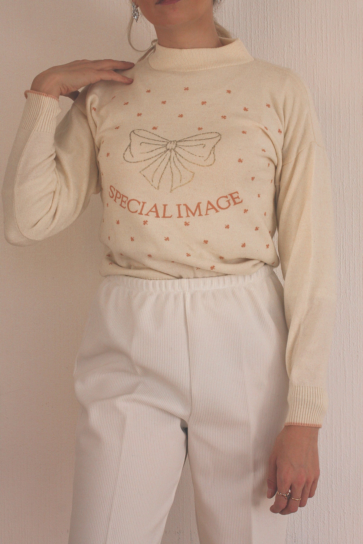 Blue knit turtleneck sweater with beige patterns M