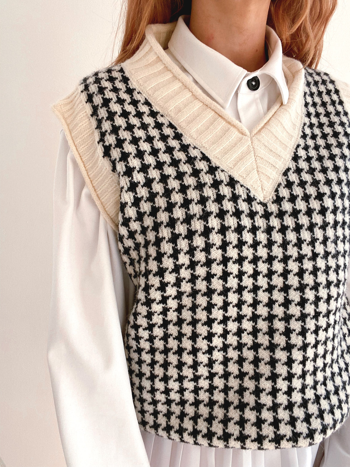 Gilet vintage sans manche en laine noir et blanc cassé L