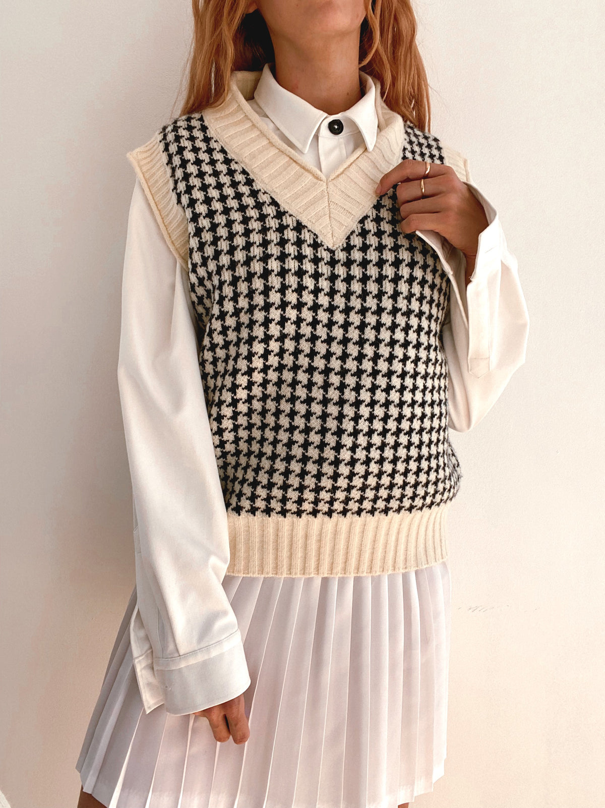 Gilet vintage sans manche en laine noir et blanc cassé L