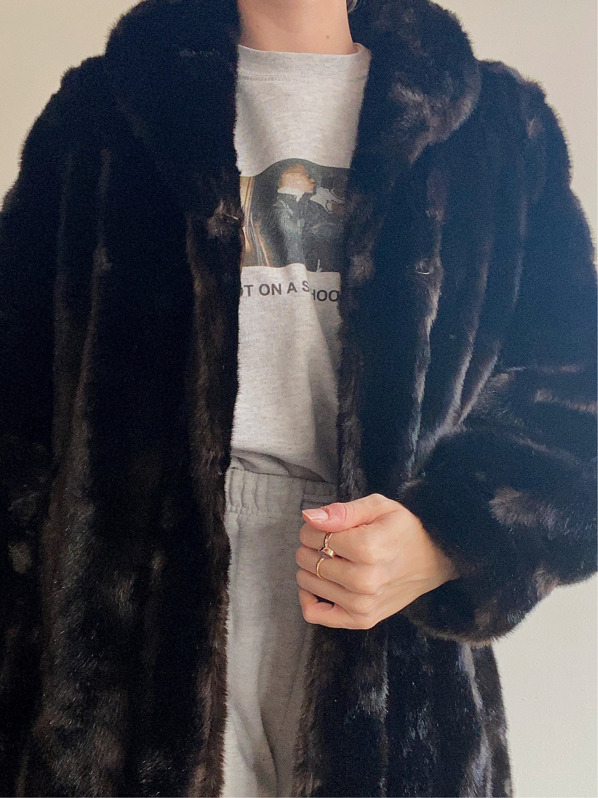 Manteau en fausse fourrure brune