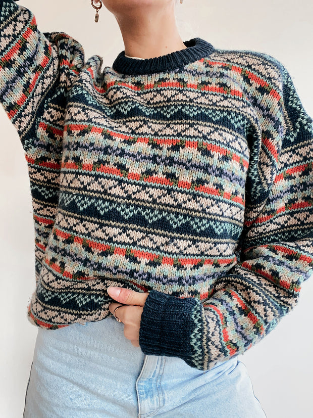 Blue knit turtleneck sweater with beige patterns M