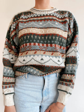 Blue knit turtleneck sweater with beige patterns M