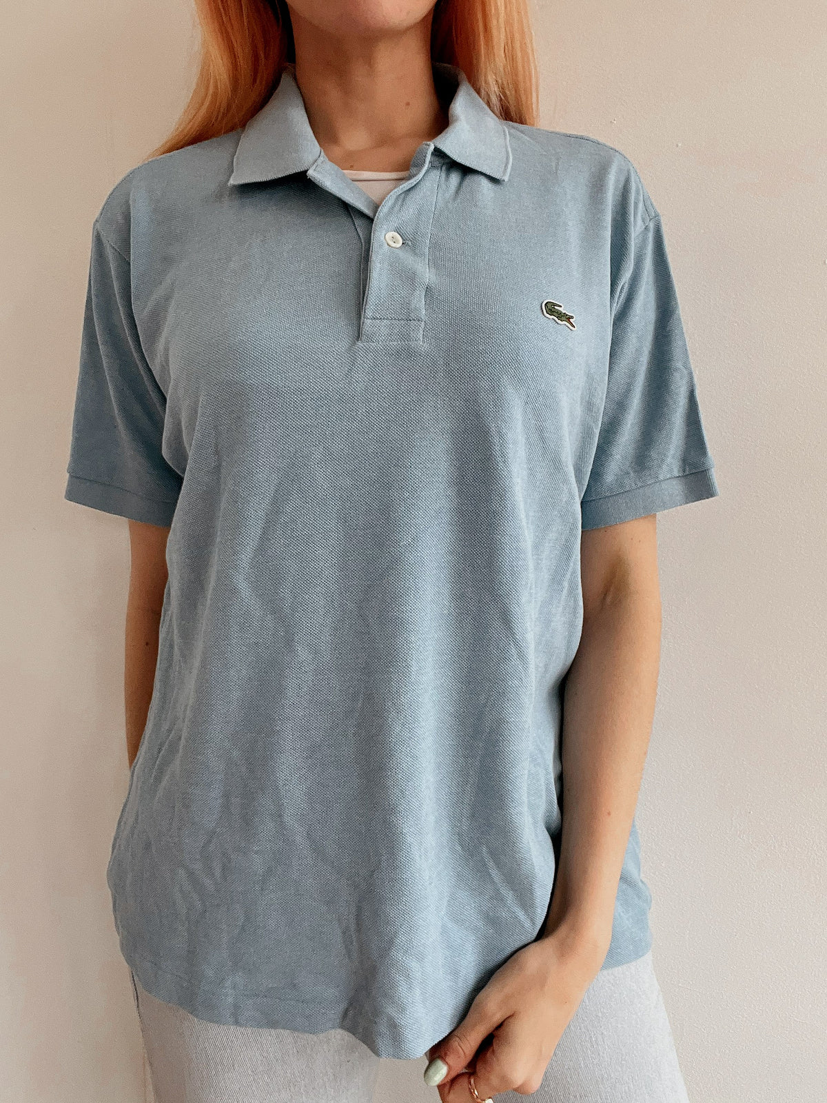 Polo Lacoste bleu clair S