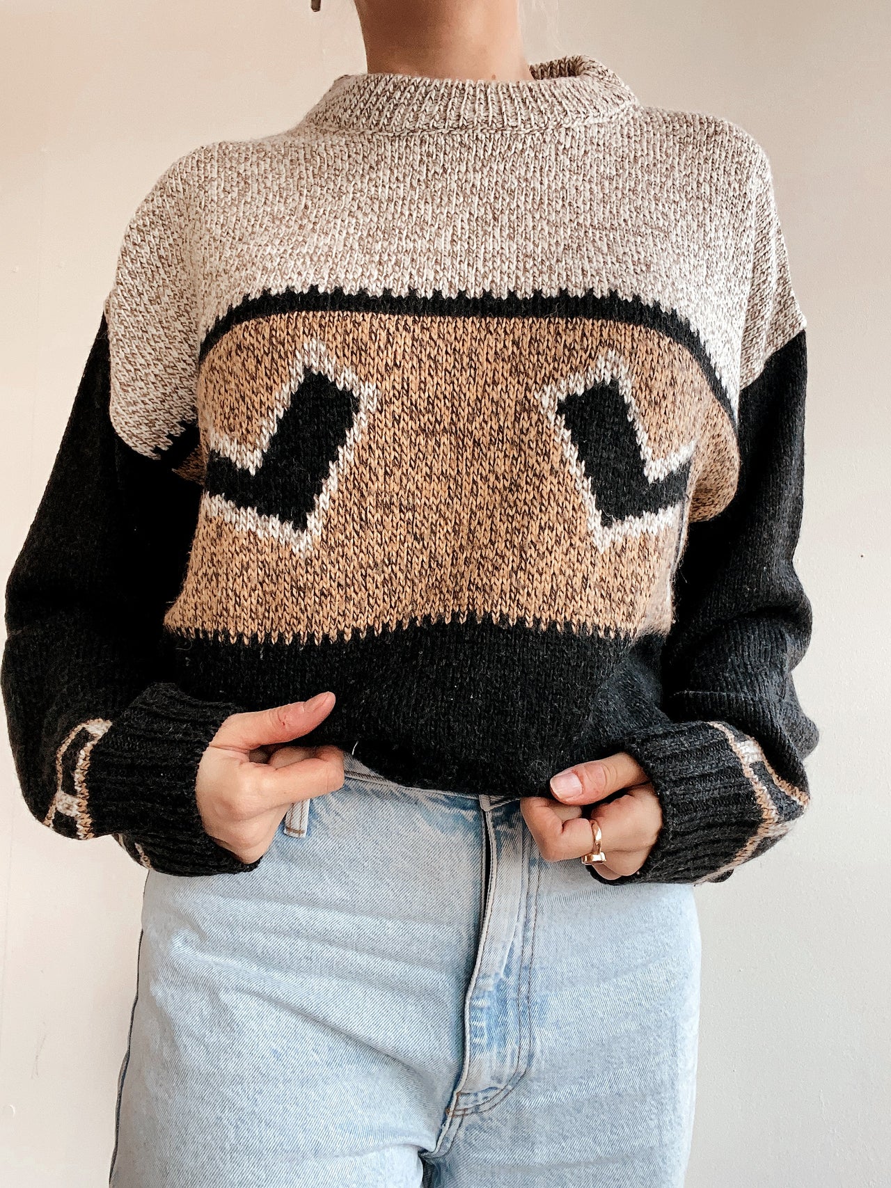 Pull vintage en laine noir et beige