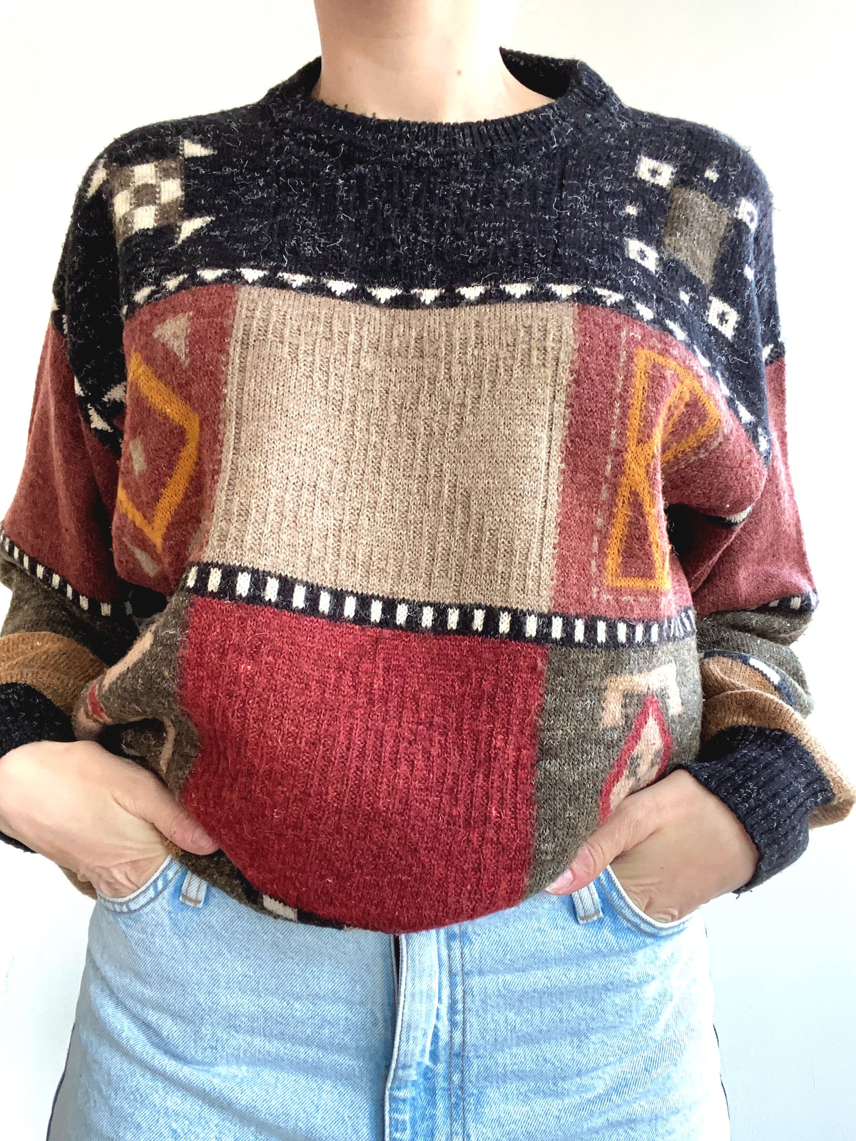 Blue knit turtleneck sweater with beige patterns M