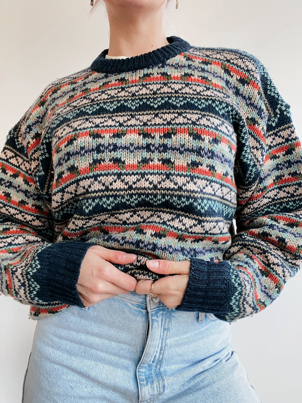 Blue knit turtleneck sweater with beige patterns M