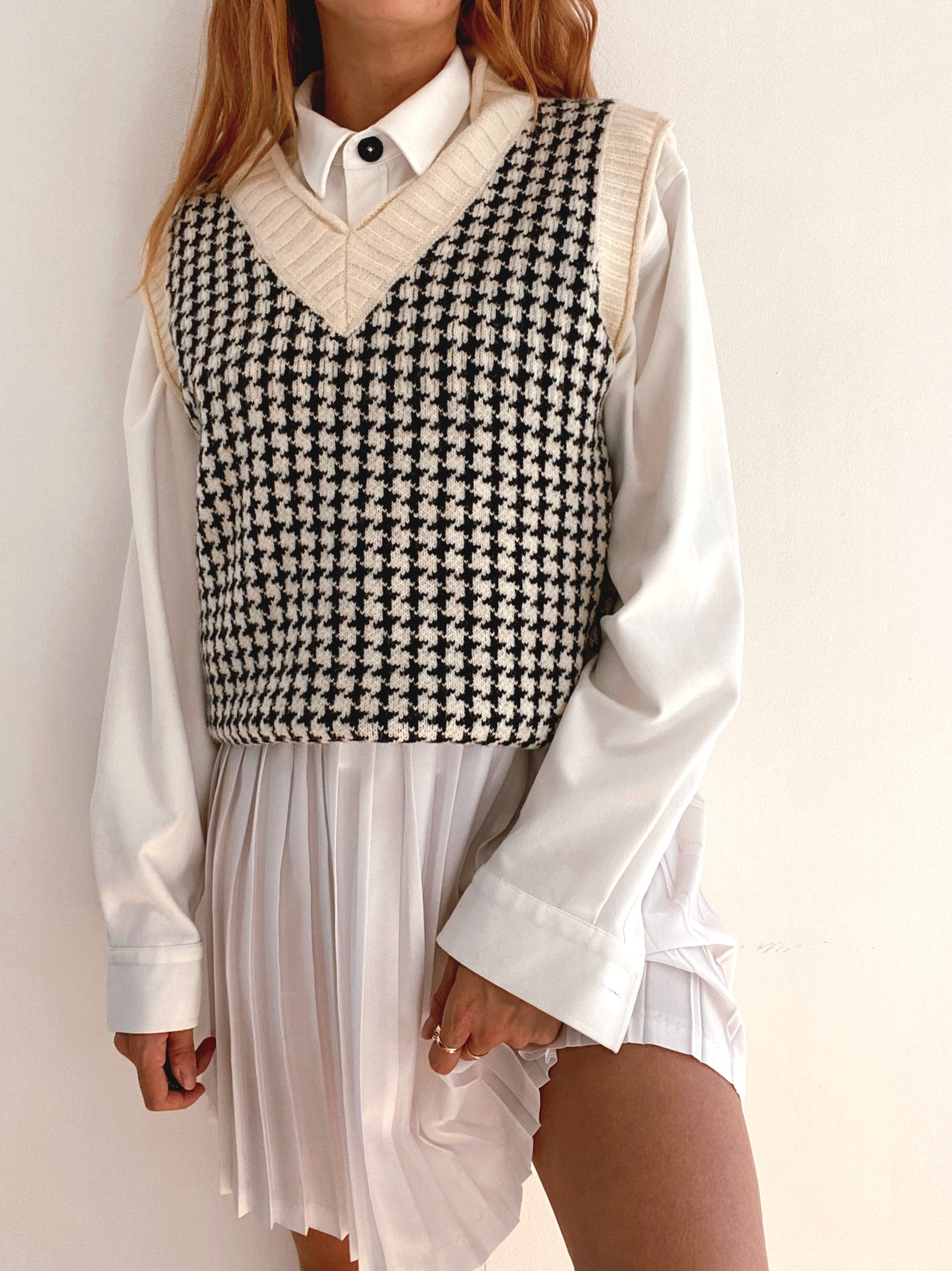Gilet vintage sans manche en laine noir et blanc cassé L