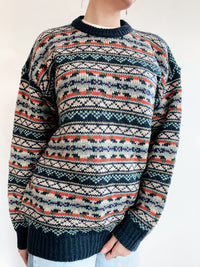 Blue knit turtleneck sweater with beige patterns M