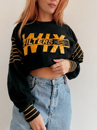 Pull vintage américain noir et jaune brodé L