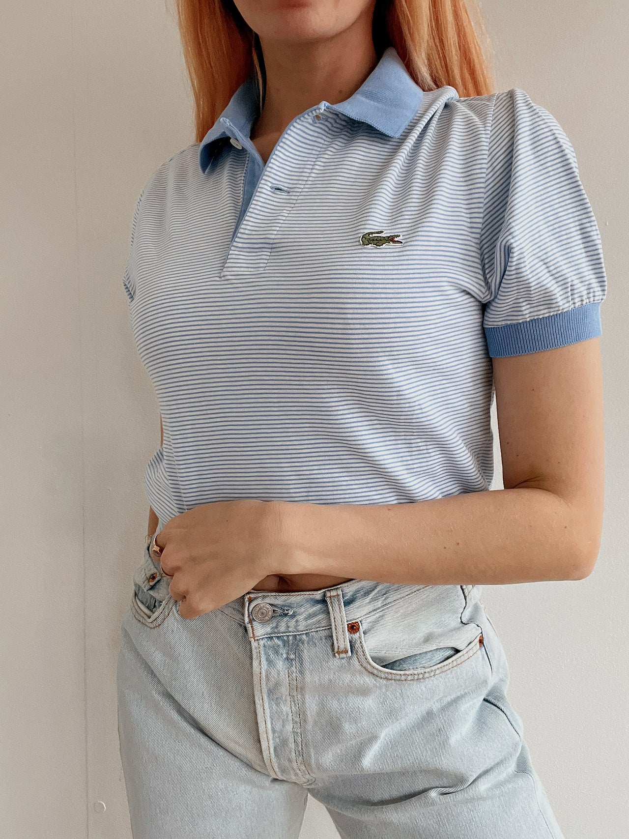 Polo Lacoste bleu clair rayé S