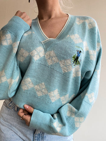 Pull vintage en maille col V bleu ciel brodé