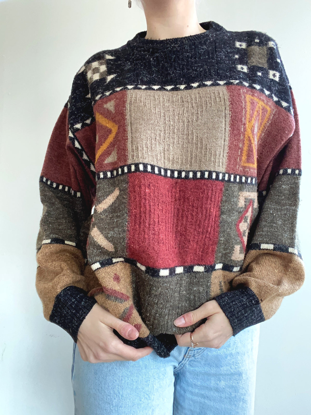 Blue knit turtleneck sweater with beige patterns M