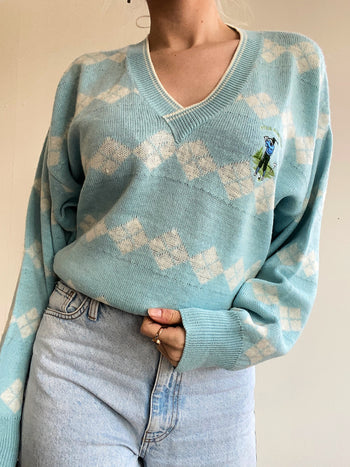 Pull vintage en maille col V bleu ciel brodé