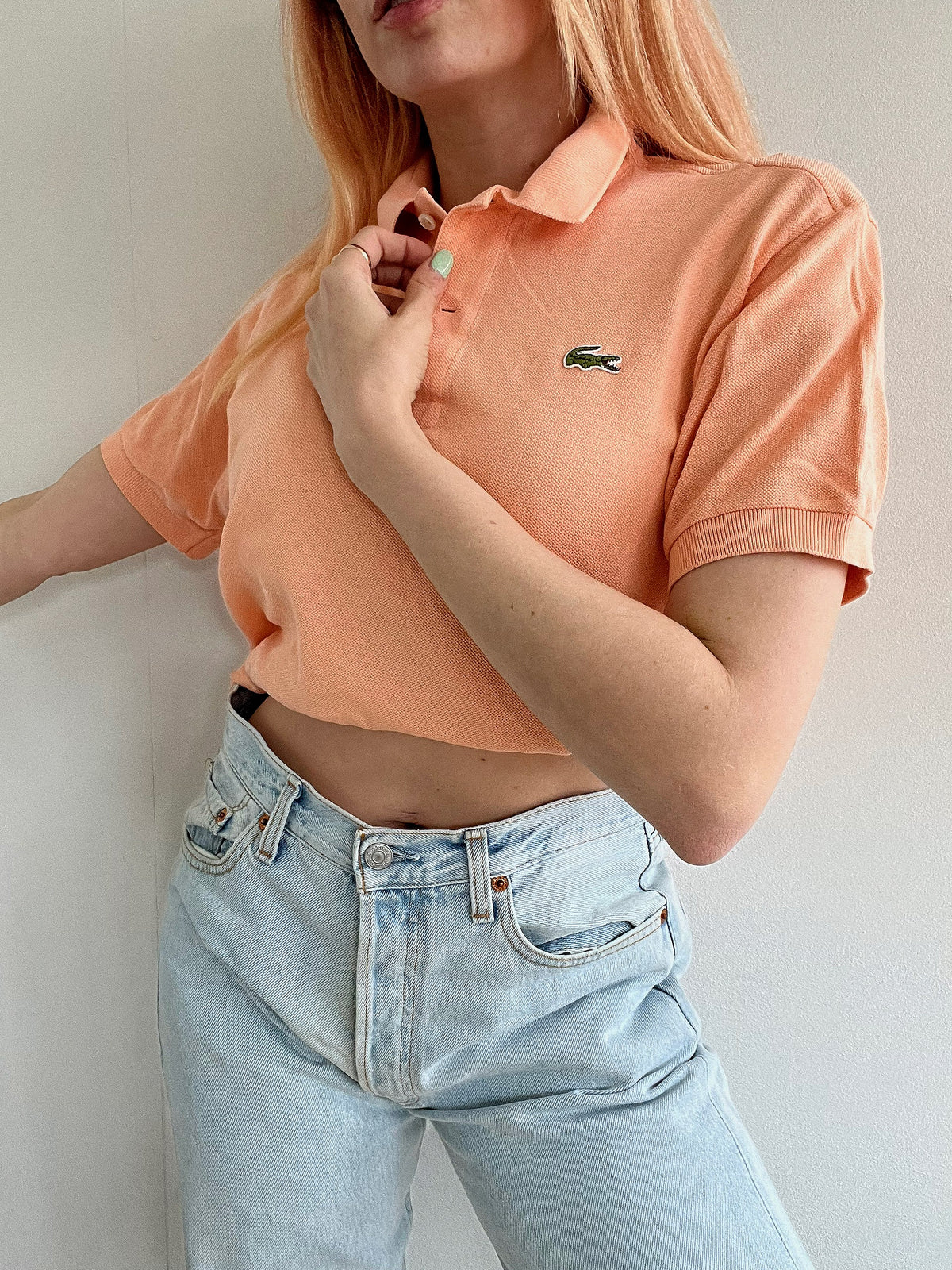 Polo Lacoste saumon clair M