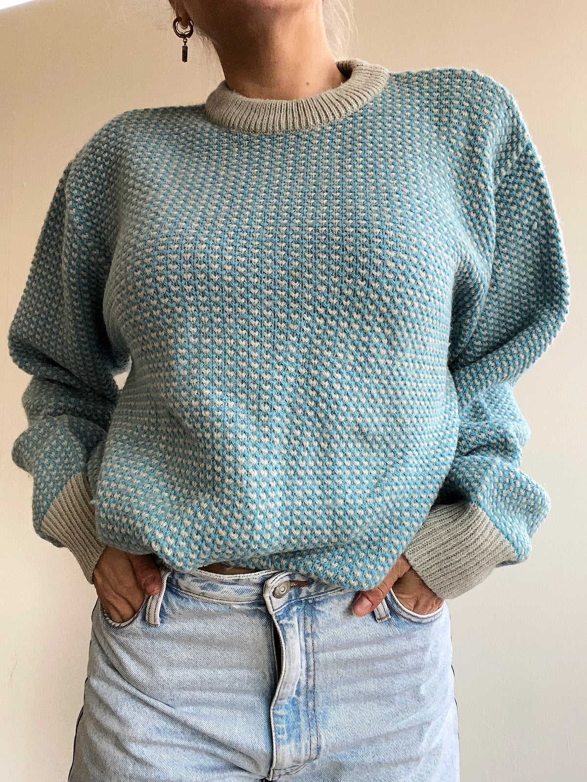 Blue knit turtleneck sweater with beige patterns M
