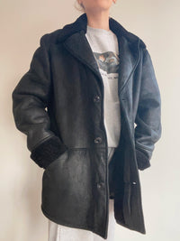 Manteau en mouton retourné noir