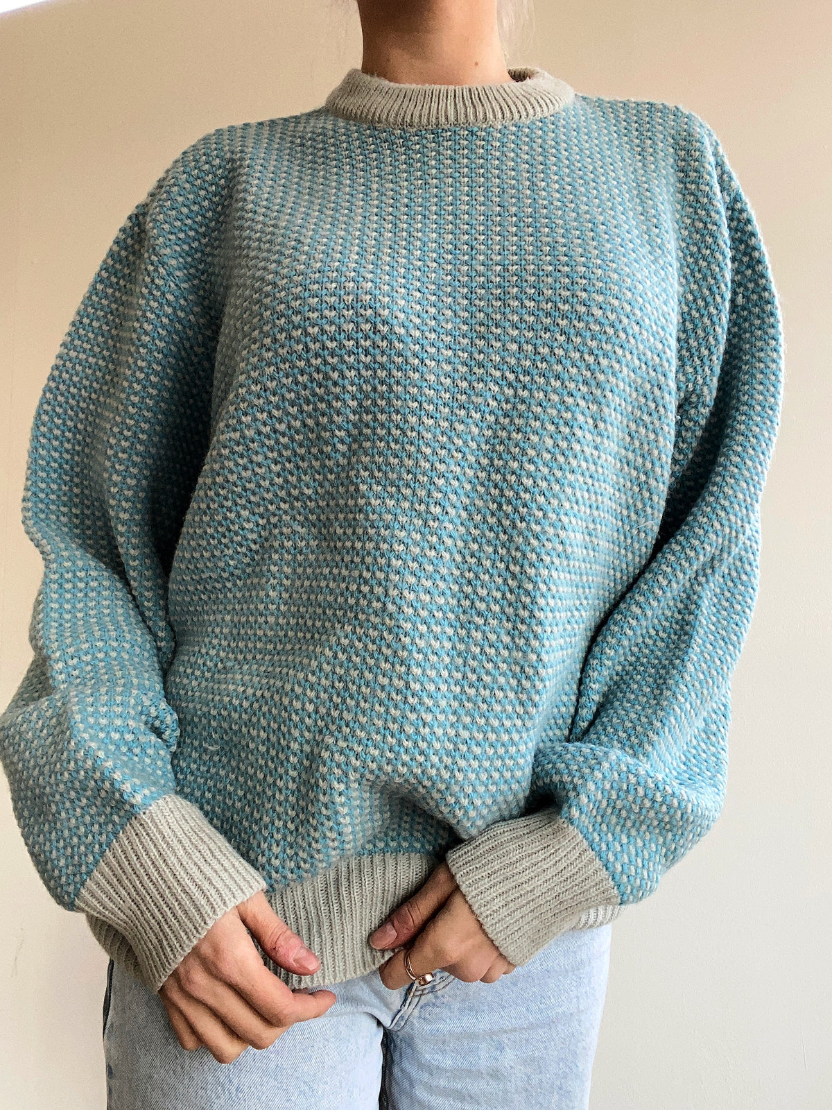 Blue knit turtleneck sweater with beige patterns M