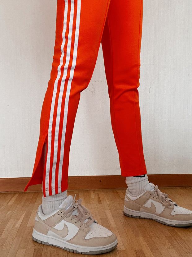 Adidas XS orangefarbene Jogginghose