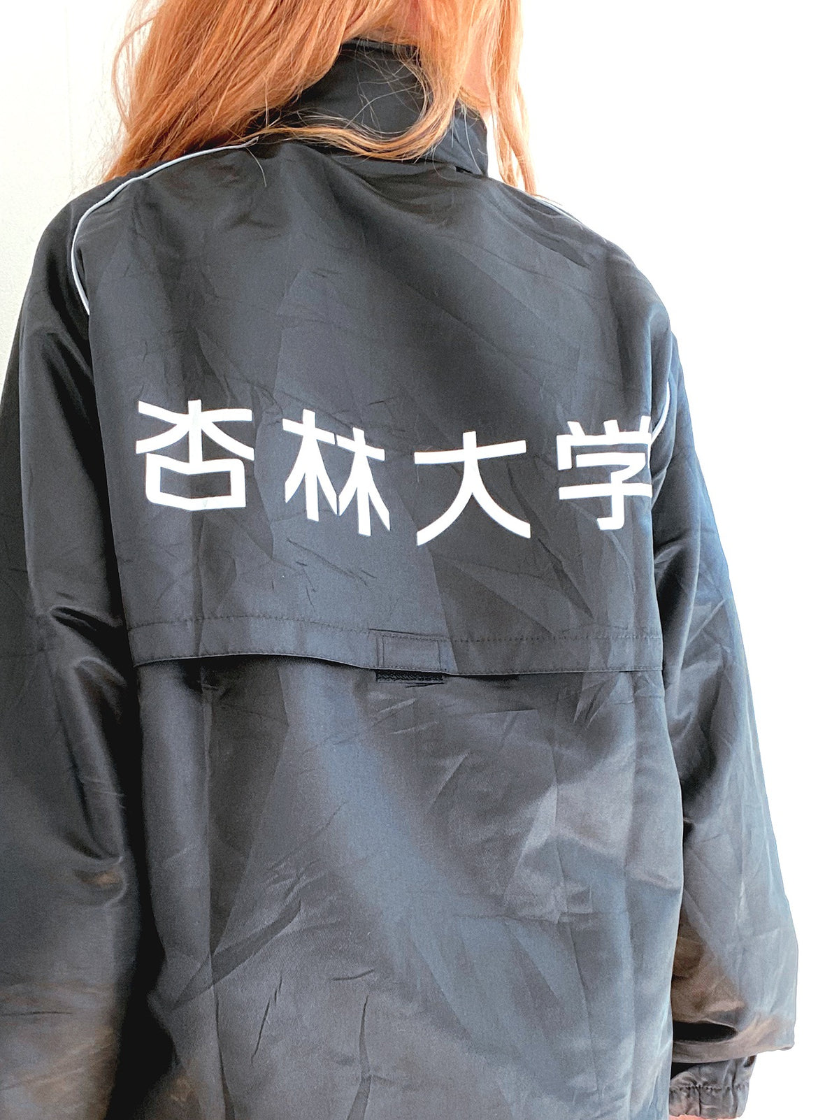 ASICS XL schwarze Windjacke