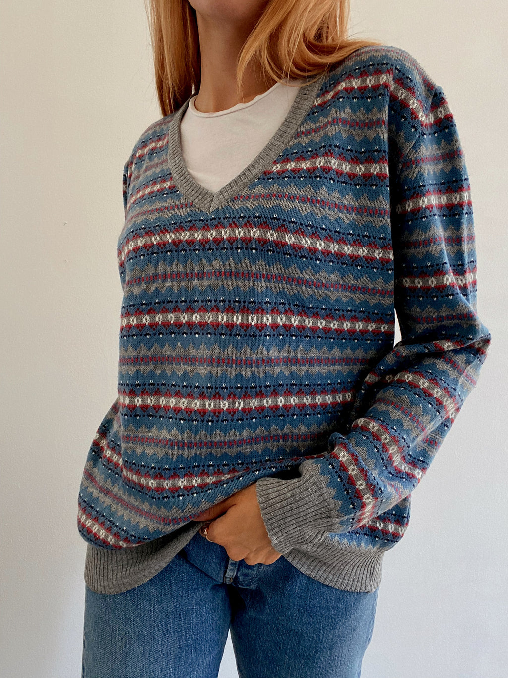 Vintage gemusterter blauer Strickpullover M/L