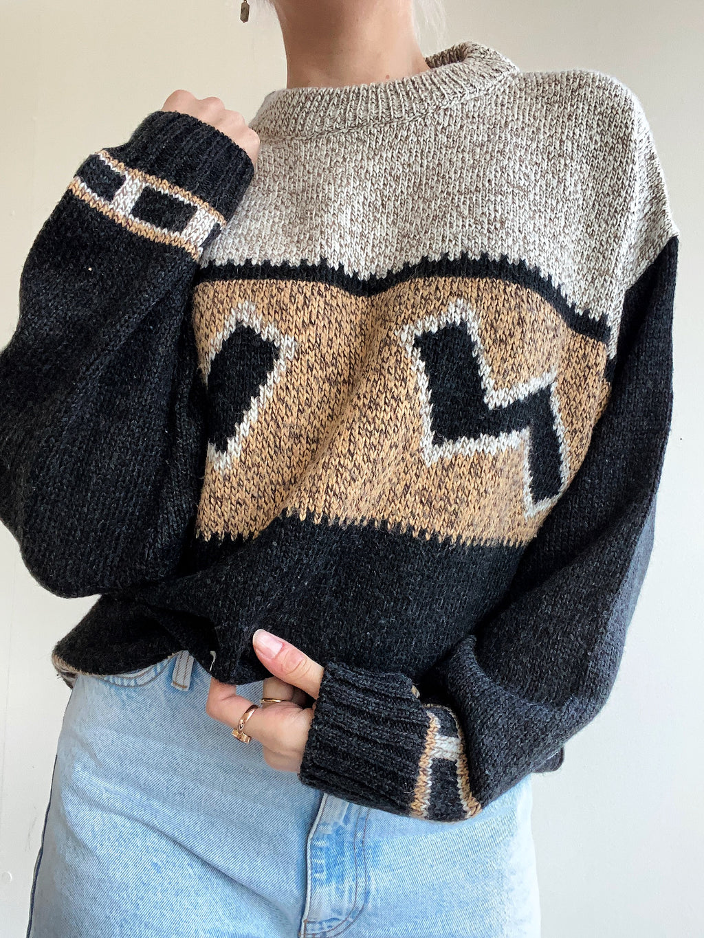 Blue knit turtleneck sweater with beige patterns M