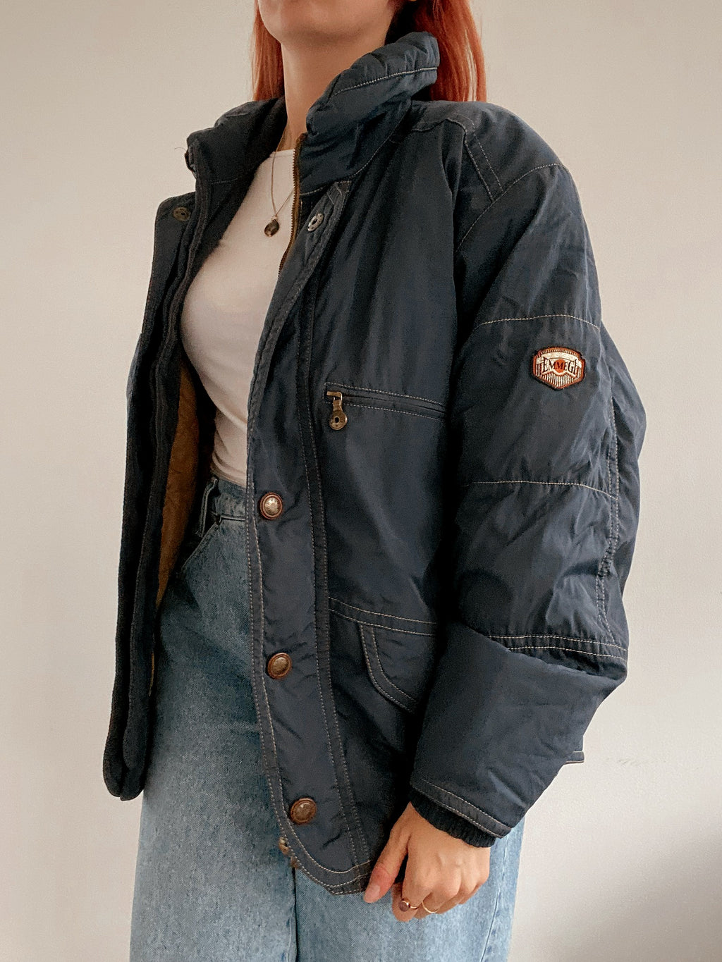 Dunkelblaue Vintage-Daunenjacke M 